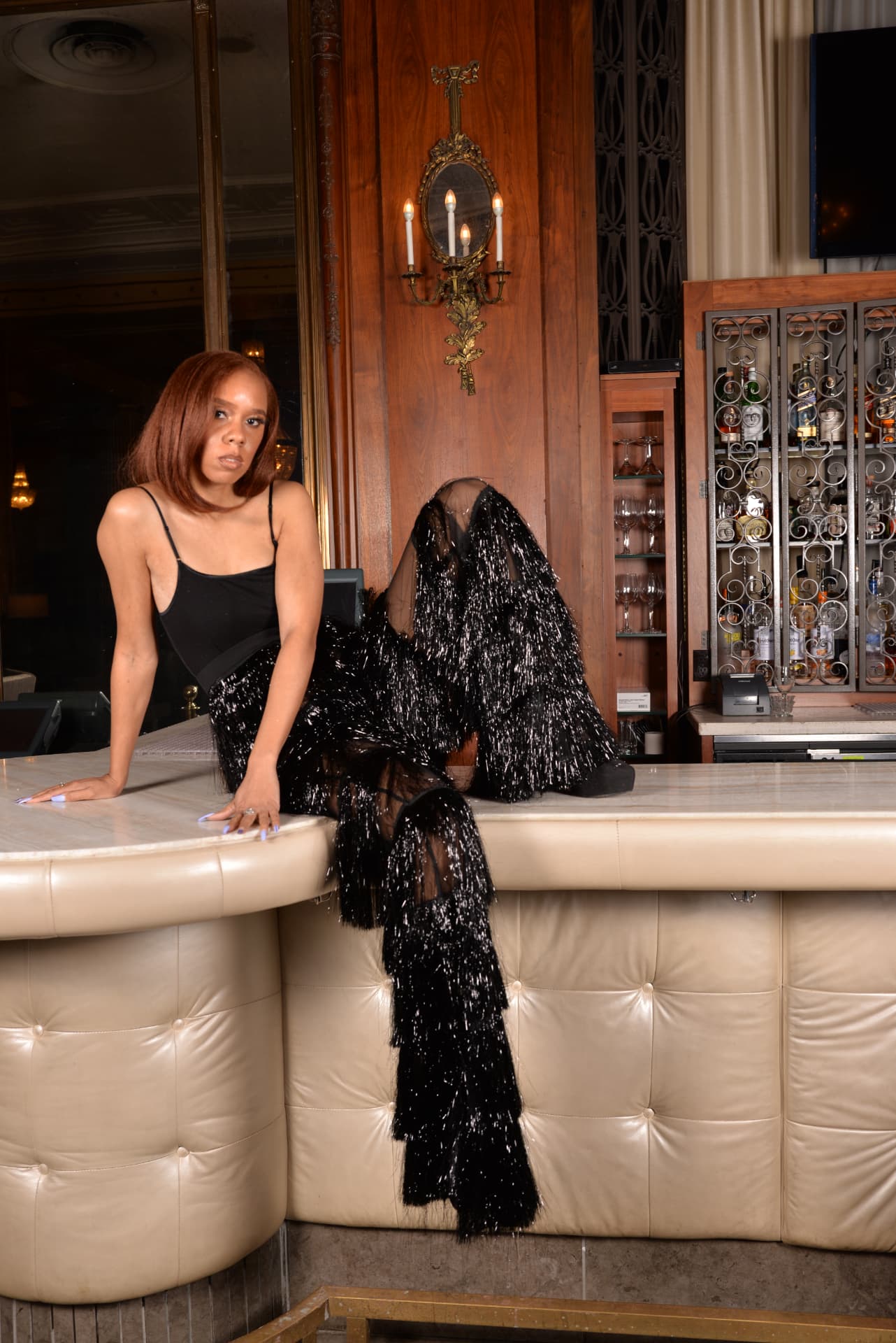 Black bodysuit with silver tinsel fringe flared trousers