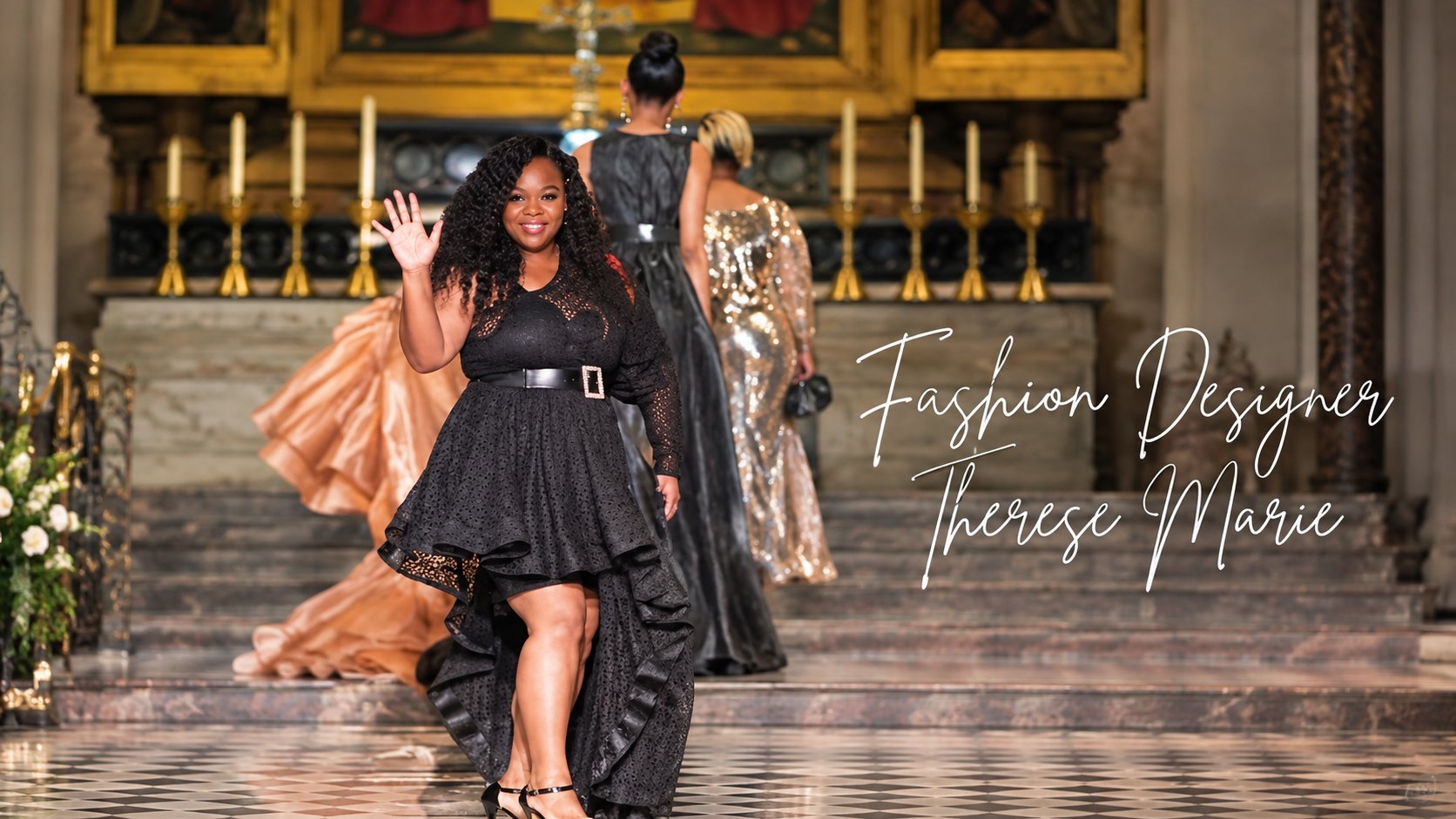 Therese Marie waving on the runway in a black lace high-low dress, models in gowns behind her, with the words Fashion Designer Therese Marie